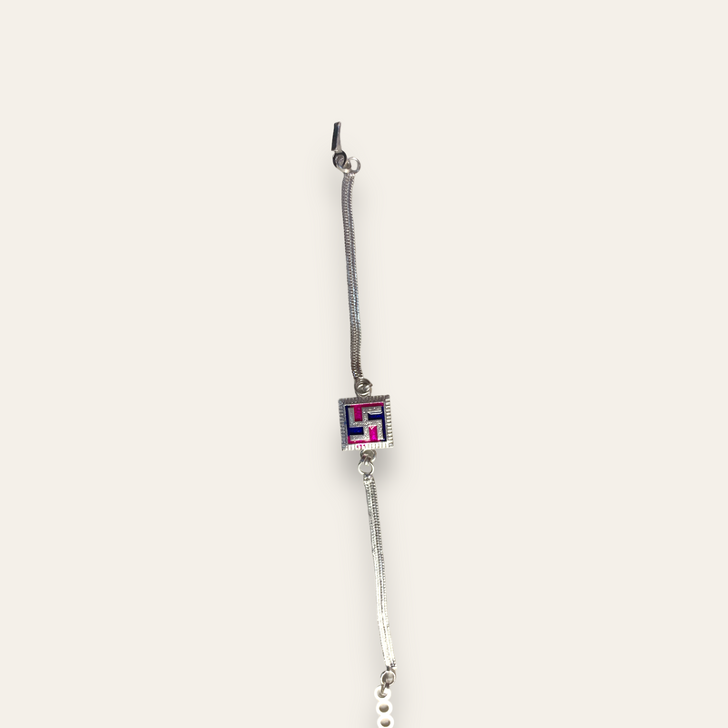 "Silver Swastik Serenity" Rakhi