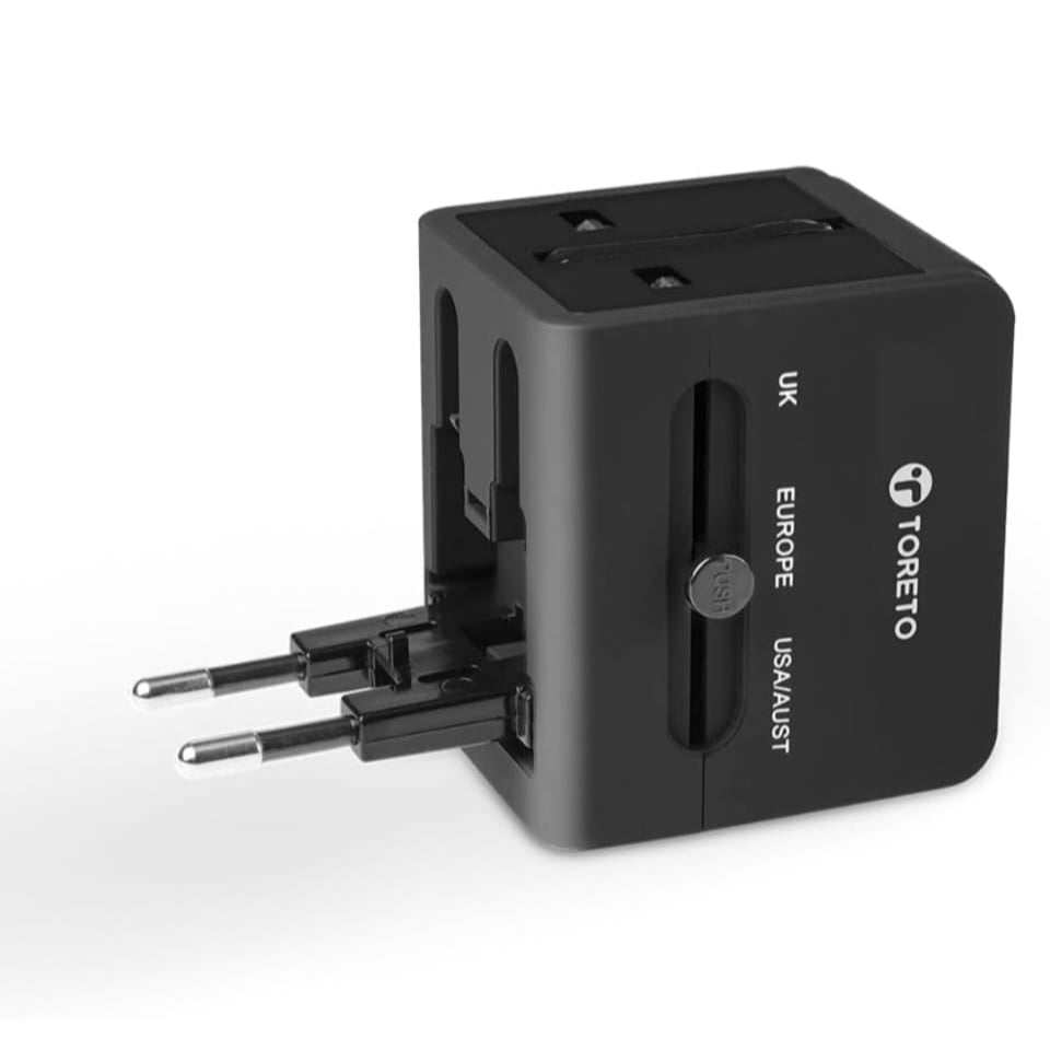 Toreto Universal Travel Adapter with Dual USB Charging Ports